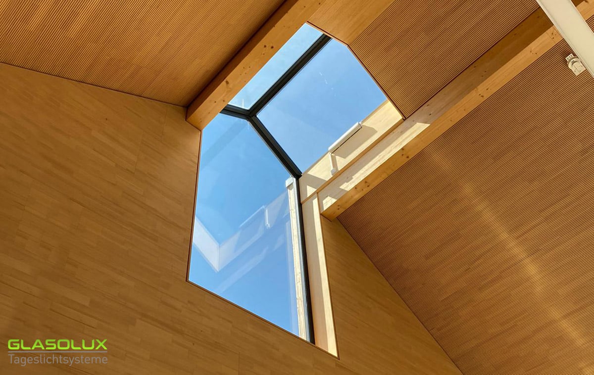 A corner window in the church roof