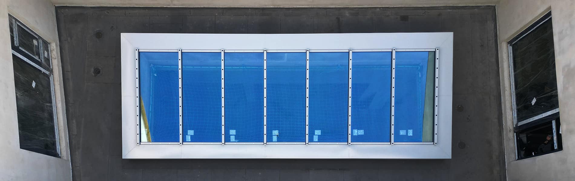 Brandschutz-Pultdach Luftbildaufnahme Luftbildaufnahme des GLASOLUX Brandschutz-Pultdaches im neuen Forschungszentrum der Uni Greifswald (noch im Rohbau).